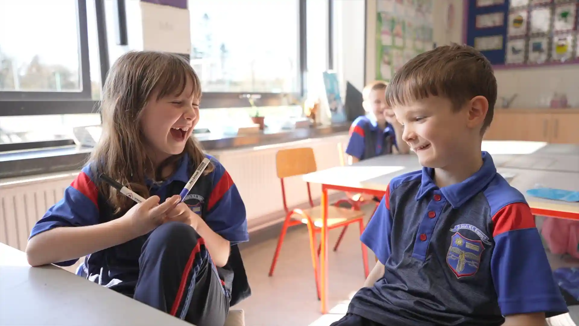 Two children laughing at St. John's National School, Kenmare Two children laughing at St. John's National School, Kenmare